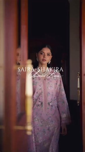 𝑾𝒆𝒍𝒄𝒐𝒎𝒆 𝒕𝒐 𝑩𝒍𝒐𝒐𝒎 𝒃𝒚 𝑺𝒂𝒊𝒓𝒂*𝑺𝒉𝒂𝒌𝒊𝒓𝒂 Unstitched Lawn Collection, starting from PKR 12900, Launching Soon ! This is a printed pink canvas with carnations, one of our favourite flower, in lilacs pinks and sages. All three panels of the shirt are adorned with cutwork borders in ivory in a diagonal composition. The daman is finished with an organza embroidered border. The neckline is flower bunch kisses here and there. A soft, breezy, cotton net printed duppatta with pallus 