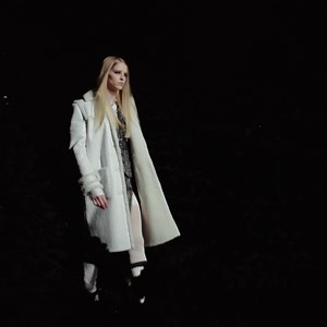 A patent sheepskin coat lined with faux fur is paired with “down jacket” style boots.​ Directed by Inez & Vinoodh.​ ​The CHANEL Fall-Winter 2021/22 Ready-to-Wear collection.​ ​See more at chanel.com/-RTW_FW21-22 | CHANEL