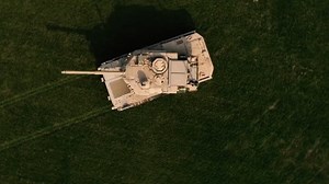 US Military new light M10 Booker firing its 105 mm M35 tank gun.