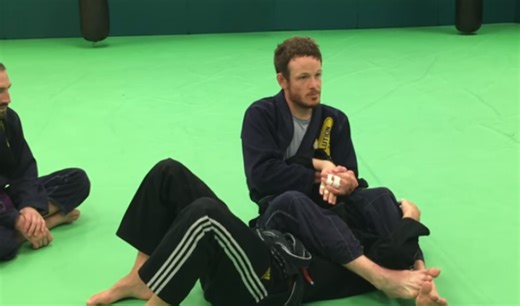 How to Wristlock Against a Lapel Grab Armbar Defense in BJJ