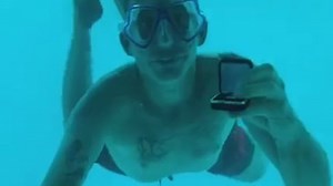 Final moments of man proposing to girlfriend underwater caught on camera