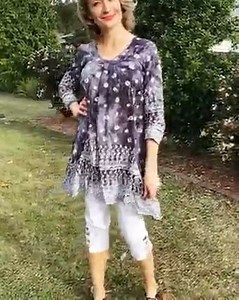 The Grey Pleated Midnight Star Tunic Top is the top that will ignite...