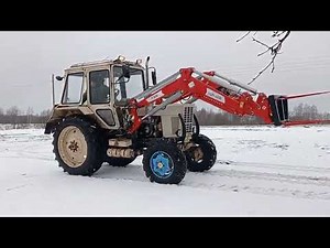 Фронтальный погрузчик INTER-TECH IT 1600 в работе.Front loader INTER-TECH IT 1600 in work.