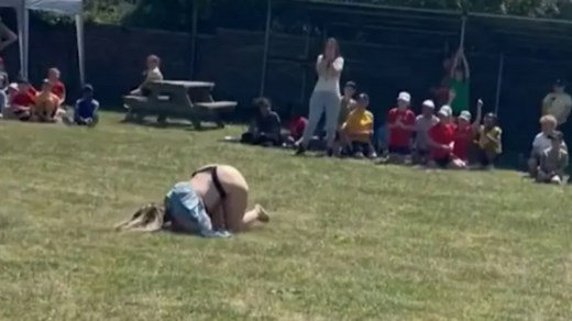 Mum flashes crowd during parent's race