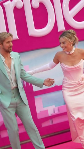 #margotrobbie and #ryangosling strut their stuff on the #Barbie pink carpet! (🎥Getty) | SheKnows