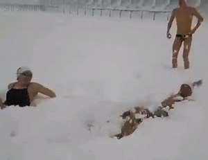 Wearing only the tiniest of speedos, the Simon Fraser University swim team decided to forego the cold water of the pool for the even colder snow of the football field. Read more: www.cbc.ca/1.3885665 | CBC Vancouver
