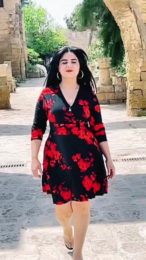 Exploring Historical Architecture in a Black Floral Dress