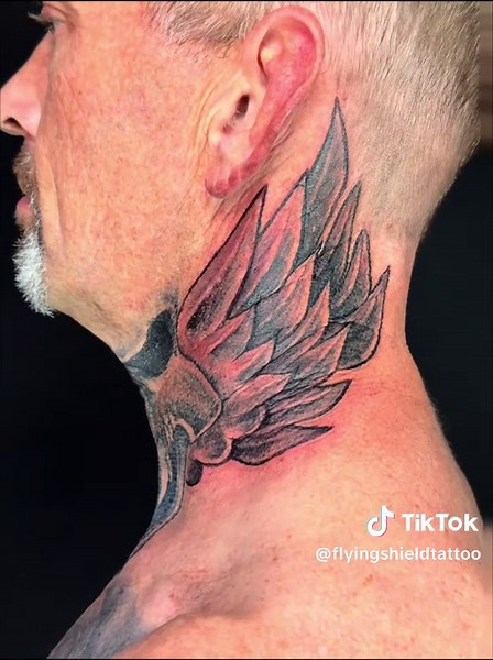 Custom Black and Gray Skull Neck Tattoo by Denny