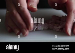 slicing fresh carrots close-up