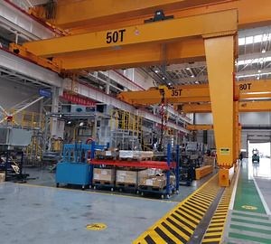 [Hot Item] Rail Mounted Portable 50 Ton Mobile Semi Gantry Crane for Machine Lifting