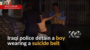 A Kurdish TV channel broadcasts the moment when police remove an explosive belt from an 11-year-old boy in the northern Iraqi city of Kirkuk. | Reuters