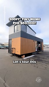 Would you live in this 10' x 30' tiny house on wheels? Selling for $69,000 🏡 Inside, this tiny house features a spacious 10'-wide interior with tons of windows and a sliding glass door at the entrance, a living room with a couch that converts into a bed (murphy bed), a desk, tons of storage throughout, a large kitchen with apartment-size appliances, a bathroom with a glass shower & space for a washer/dryer combo unit, & a lofted bedroom! Built by California-based Neohaus & selling this model fo
