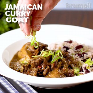 My take on Jamaican curry goat, fall-off-the-bone tender meat cooked in a spicy yet fragrant curry sauce loaded with spring onions, allspice and thyme. This is very much a slow-cooked dish that benefits from an overnight marinade before a 3-hour cooking time. But it is very easy and most of your time is spent kicking back drinking in the heady aroma. | Krumpli - Eating In Should Be Special Too