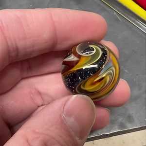 Infinity swirl marble, made with the ashes of “Monster Cat” 🐈‍⬛ | Davenport Memorial Glass