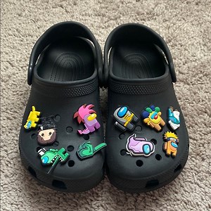 CROCS Unisex Black Sandals with Ventilation Holes and Rotating Heel Strap