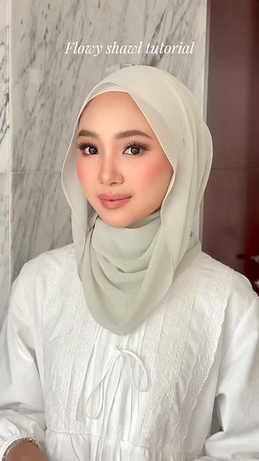 35K views · 86 reactions | You girls have been asking for this shawl tutorial, so here it is 懶 This style is airy, flowy, and looks even better using our Chiffonsilk ✨ Model is wearing Harbour Dew, available on our website, TikTok & physical store. | Guzel Kl Empire | Facebook