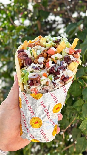 19K views · 155 reactions | The Halal Guys Chicken Shawarma is BACK!  We indulged in the fully loaded pita with that succulent Chicken Shawarma. Marc turned up the heat with extra hot white sauce, making it a fiery hit! How do you like your shawarma served?  | Foodbeast | Facebook