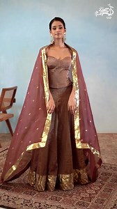 With rustic shades of brown and chrome, the wedding lookbook gets a sparkly update this festive season. Our Brown Handcrafted Tissue Silk Kalidaar Lehenga Set With Organza Dupatta comes with a corset-like blouse, perfectly paired with a lehenga skirt adorned with lapa trims and delicate tassel tie-ups. The soft organza dupatta comes finished with handwoven booties all over, tying the whole look together. Explore the collection at www.weaverstory.com or at our studios in Delhi and Hyderabad. 𝑭𝒐