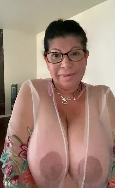 Busty Mature Babe With Glasses Teases Huge Tits In Sheer Top