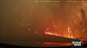 WATCH: Dashcam video captured the reaction of a driver and passenger as they quickly become surrounded by smoke, embers, and fire in Hammonds Plains, N.S. as a wildfire raged in the province. Read more: https://globalnews.ca/news/9729502/halifax-wildfire-state-of-emergency/ | Global Halifax