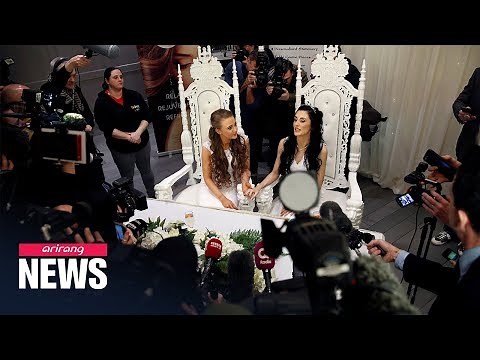 Brides in Northern Ireland become first to wed after same-sex marriage ban lifted