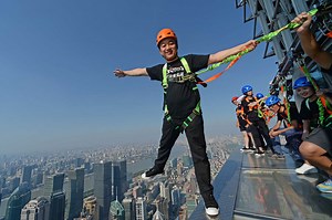 glass-bottomed skywalk opens along the edge of jinmao tower’s 88th floor in shanghai
