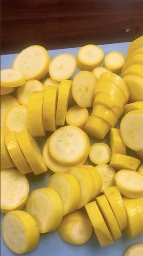 Volunteer work at Samaritan soup kitchen: serving yellow squash, zucchini, onions and bread.