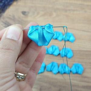 You will love making roses with ribbon cord folding. | Lady Loves Knitting