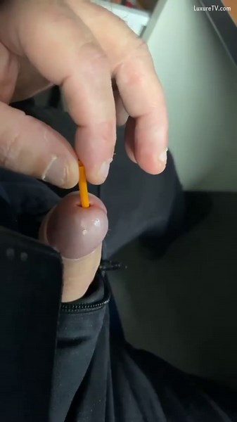 Insertion lover dude inserting metal rod in his hard cock