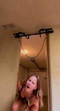 Woman Gets Hit by Resistance Band While Doing Pull ups - 1372876