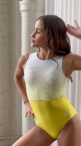 Presenting the fifth and final leotard of our Voyage Collection: Citrine Charm. Prepare to be enchanted by this exquisite scoop back leotard, where a bright yellow lower body seamlessly transitions into a luminous white upper body. Bedecked with iridescent rhinestones adorning the front and a sleek belt embellishing the back, Citrine Charm is a vision of unparalleled elegance. Don’t miss out on purchasing this beauty! 💛Shop Citrine Charm and the rest of the Voyage Collection on Friday, April 12