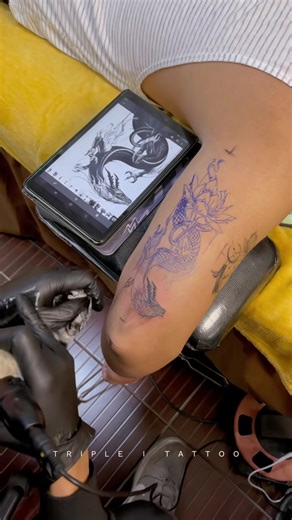 Adding a lotus in a dragon tattoo, for instance, represents wisdom....