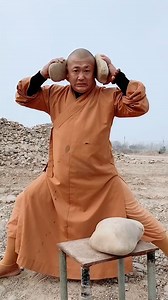 Stone Breaker: Shaolin Qigong Power Unleashed 💪⚒️ At the Shaolin Temple, a monk doesn’t just strike—he destroys. Starting with smaller stones, he splits a massive boulder in half, then elbows an even bigger stone twice, breaking it apart with raw Shaolin power. This is Qigong mastery in motion. #ShaolinPower #KungFuMastery 🥋🔥 | Wing Chun News