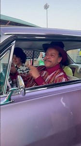 Suga Free pulled up in a purple lowrider 🚗