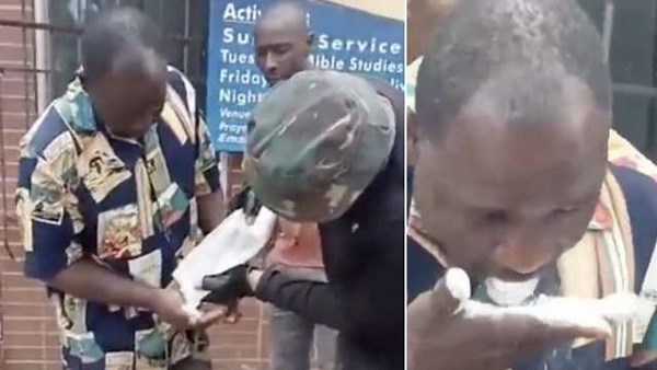 Street Justice: Alleged Nigerian Drug Dealer In South Africa Forced To Eat The Drugs He Was Selling To The Community!