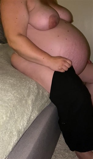 Pregnant Woman With Gigantic Belly Strips