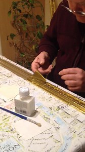 Applying gold leaf at Leslie Castle. | Leslie Castle