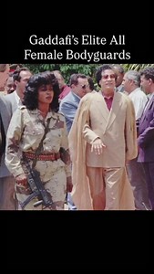 Muammar Gaddafi’s Amazonian Guard was an elite, all-female security unit that served as his personal bodyguard for much of his rule in Libya, particularly from the 1980s through the 2000s. Officially known as the Revolutionary Nuns, the unit was composed of young women selected for loyalty, physical fitness, and perceived discipline. They were trained in martial arts, firearms, and close-protection tactics, and were instantly recognizable by their uniforms—often camouflage with berets or sometim