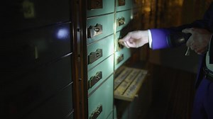 A secure bank vault holds valuable cash and assets for investment, ensuring safety and protection