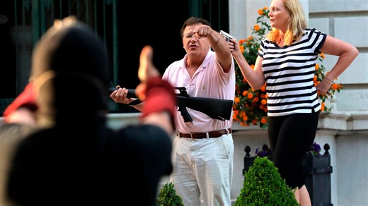 Cops storm mansion of St Louis couple who pointed guns at Black Lives Matter protesters to CONFISCATE AR-15