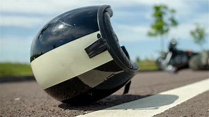 What Does A Helmet On The Ground Behind A #Motorcycle Mean? | SlashGear