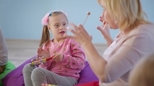 Child Down Syndrome Enjoying Music Lesson Stock Footage Video (100% Royalty-free) 1066359001 | Shutterstock