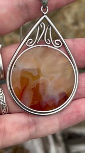 ***DANCING SPIRIT COLLECTION *** Stunning Handmade Carnelian Pendant €23 Carnelian crystals are celebrated for their rich, vibrant energy that stimulates courage, motivation, and other positive life choices. Healing Properties: Carnelian is believed to stimulate the metabolism, aid in fertility issues, and enhance the absorption of vitamins and minerals while also providing emotional warmth and support. Protection: The crystal is touted as a shield that wards off envy, rage, and resentment, whet