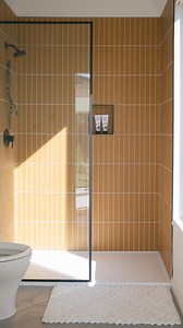 Affectionately called @thenooq, this Montana new build channels the great outdoors with a Glass Tile shower in #FireclayFalcon 🧡 - Tile shown: #Fireclay2x12 in Falcon Matte - Design 📷: @alexstrohl & @andreadabene - #fireclayglass #glasstile #handmadeglass #fireclaytile #glassbathroom #bathroomdesign #scandi #minimalism #handmadeglasstile #fireclay2x12 #thenooq #thenooqhouse #bathroominspo | Fireclay Tile