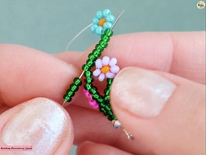 23K views · 402 reactions | How to make a Chain-Spring Flowers Necklace | Wedding Decoration Ideas | Facebook