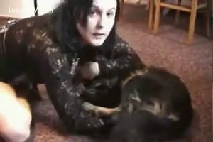 Big tit brunette babe sucking her little dogs cock