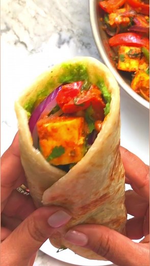 118K views · 870 reactions | Popular Indian street-food, Paneer Kathi rolls are warm, layered parathas filled with spicy paneer, mixed peppers and sweet caramelized onions. Recipe - https://ministryofcurry.com/easy-paneer-kathi-roll/ #ministryofcurry #easyrecipes #dinnerideas #indiancuisine #vegetarianfood #vegetarianrecipes | Ministry of Curry | Facebook