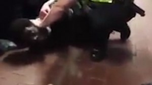 Police aggressively arrest 20-year-old black man