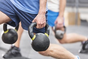 Kettlebell swings and back pain. What causes it and how to fix it.