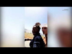 Australian model Sahara Ray dances and rides on motorbike topless